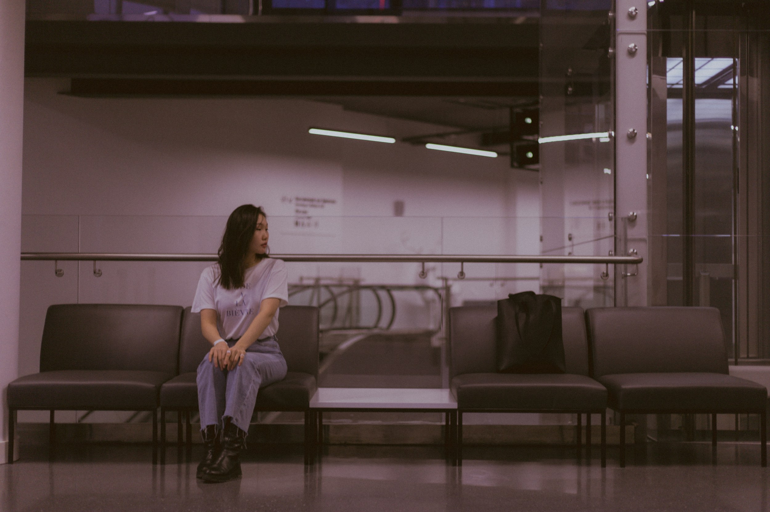 Patient waiting alone in a clinic corridor
